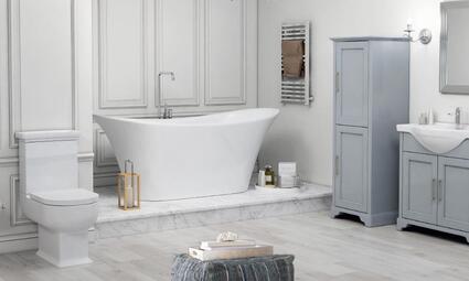 Bathroom Suite Layout: White Toilet and Freestanding Bath