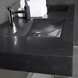 double black stone basin and taps