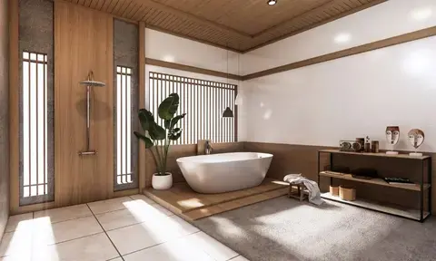 A Bathroom Space With White Freestanding Bath