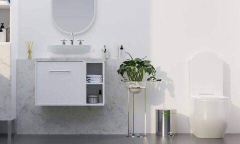 White Bathroom With Small Vanity Units and White Toilet