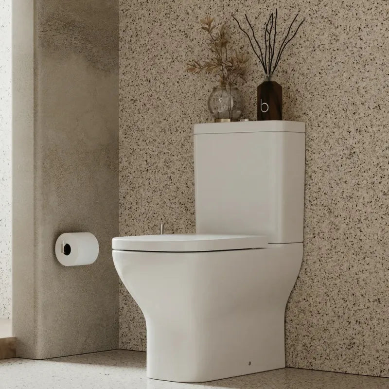 Ashford close couple pan in standard fully enclosed white, clean design with concealed pipework