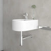 Round bottle trap in chrome, compact space-saving design shown installed beneath wall hung basin