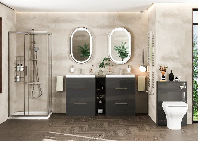 Modern bathroom with gray vanity, toilet, and shower enclosure.