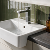Square semi recessed ceramic basin with chrome mono mixer tap on a slate grey worktop