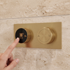 Close-up of the brushed brass digital shower valve display showing 38 degrees