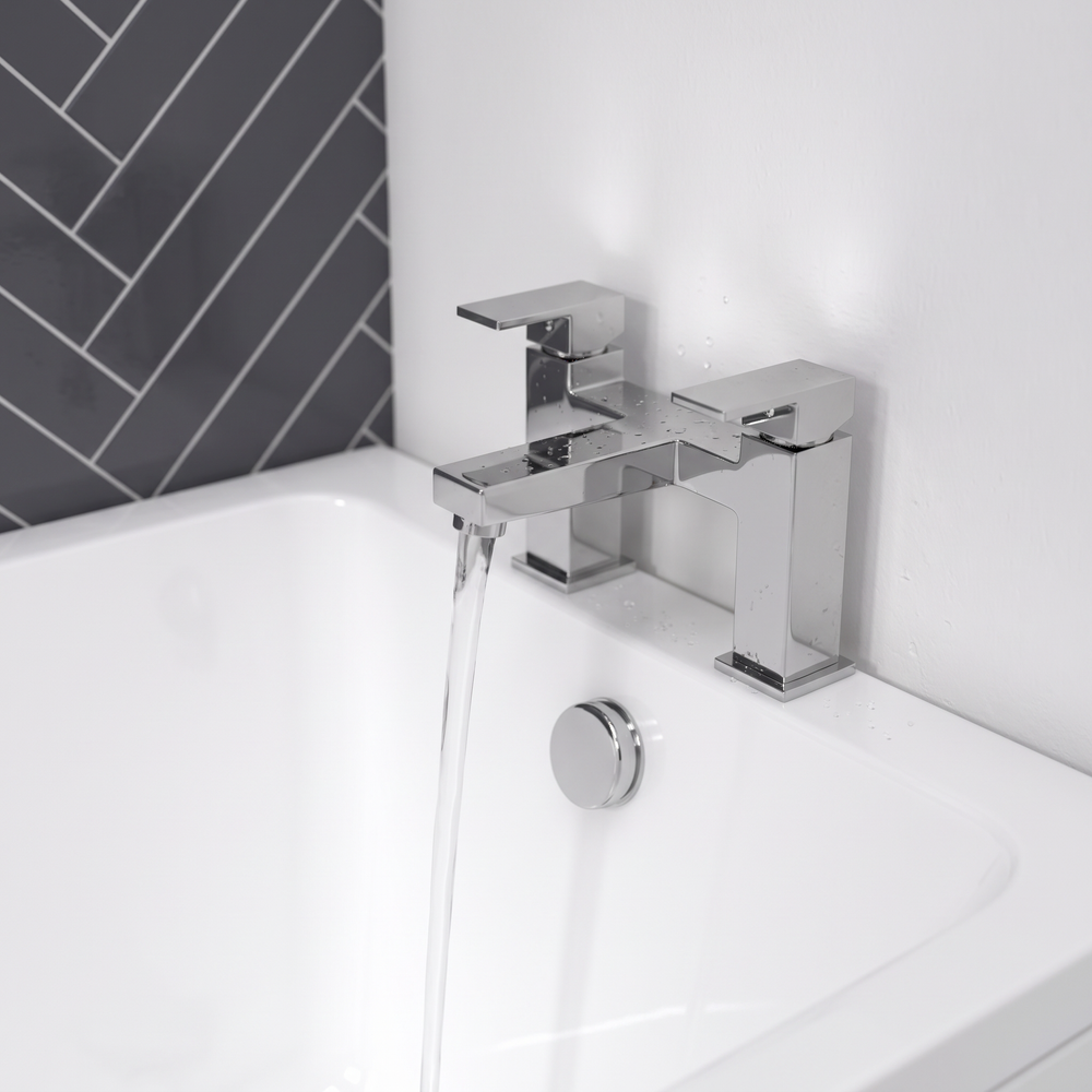 Close-up of the square Slade deck-mounted bath filler mixer tap on the bath rim