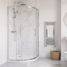 900 x 900mm chrome quadrant shower enclosure with sliding doors on a low profile white tray