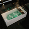 Petite 1400 x 700mm 6 jet whirlpool single ended bath with whirlpool jets running