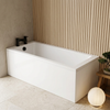 1700 x 700 single ended bath with white panels and matt black bath filler tap in a Japandi-style bathroom