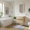 Bright bathroom with the Akron rustic light oak wall hung vanity and white basin as the focal point
