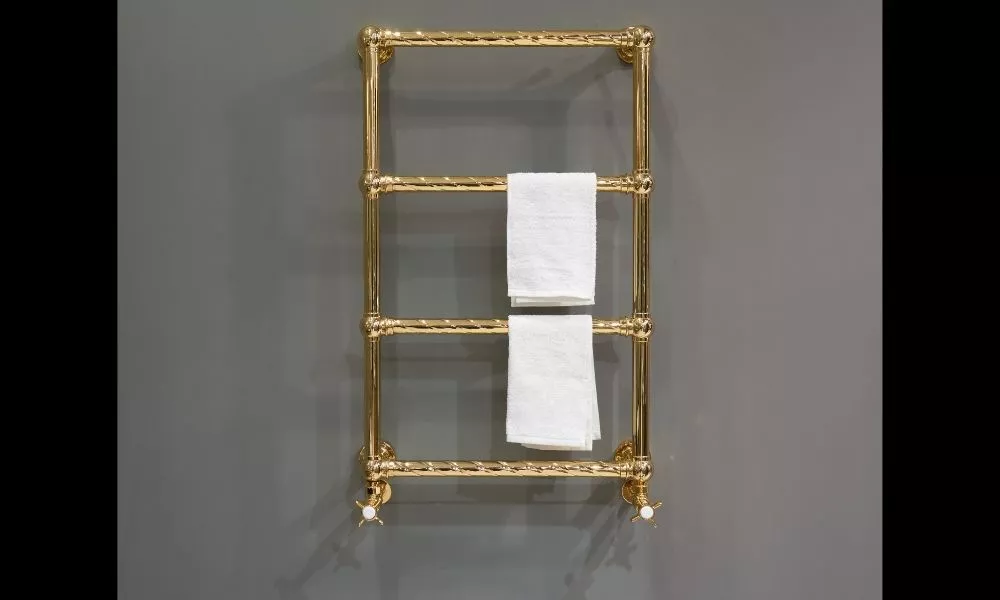 Image-Of-Golden-Towel-Radiator-With-Towel