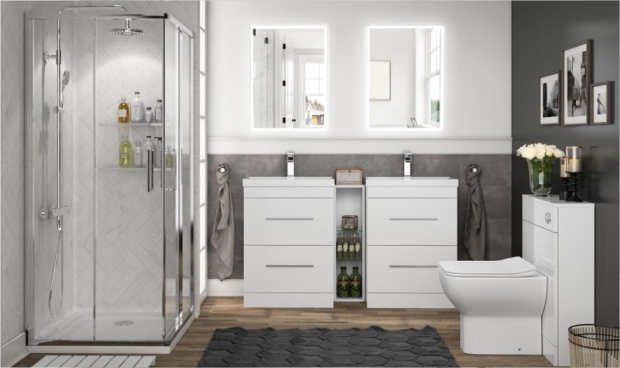 Suite containing a bath, toilet, vanity unit and tallboy