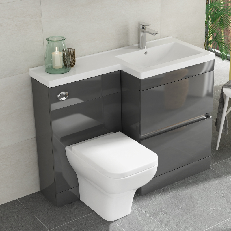Space saving toilet and outlet sink