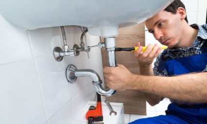 Man Installing a Bathroom Sink/Basin