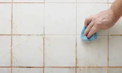 7 Ways You Can Clean Your Shower Door Tracks (Even Those With Mildew)