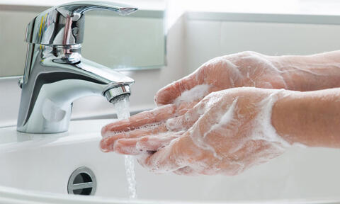 Men's bathroom doors have SIX times more germs than ladies