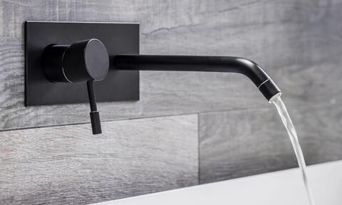 Image-Of-Black-Wall-Mounted-Bathroom-Tap