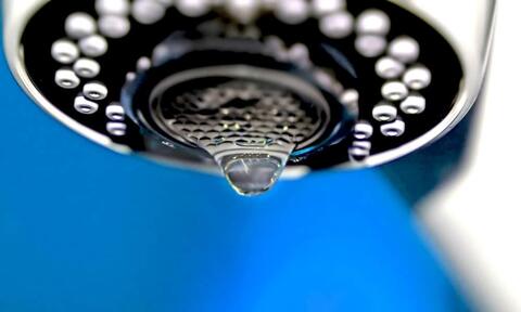 Water Drips From Round Shaped Shower Head