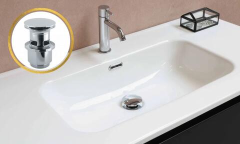 Click Clack Basin Waste Installed on a White Basin