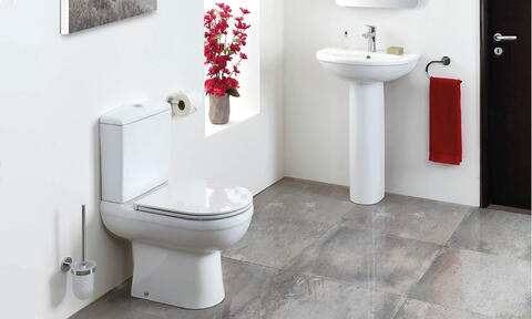 Whtie Close Coupled Toilet and Bathroom Sink