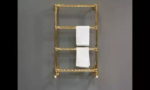 Image of Golden Towel Radiator With Towel