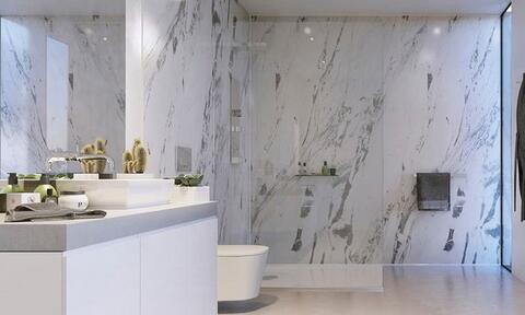 Bathroom Space Installed With Wall to Floor Tiles