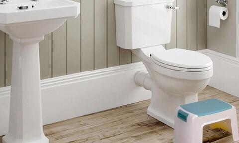 White Toilet With Step Stool for Children