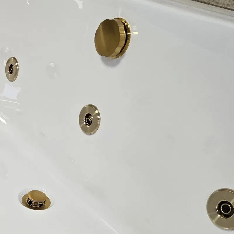 Close-up of Whirlpool Jets in Brushed Brass