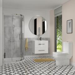 White bathroom shower suite with vanity unit and toilet