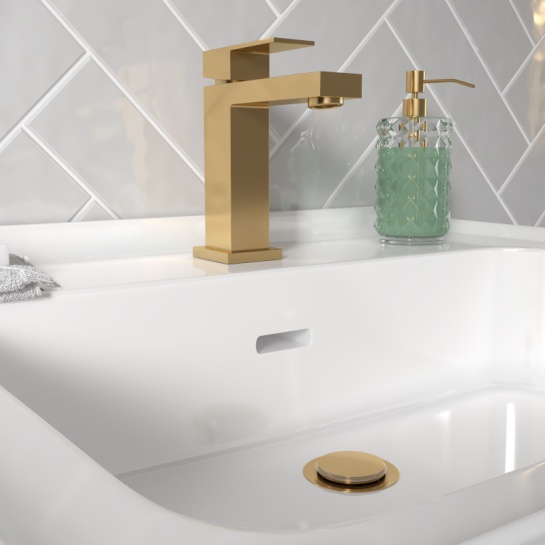 BC Standard Gold Basin Mixer Tap with Single Lever Angled View of Gold Tap with Basin and Gold Waste