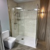 Radiant Walkin Brushed Gold 10mm Wetroom Panel 1000x2000 Showroom Lifestyle Image for Radiant Brushed Gold 1800 Walk-in Shower Enclosure for Recess with Slate Tray: Optional Hinge Panel, Waste